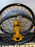 Surron ultra bee wheels in gold and black size 18" rear and 21" Front